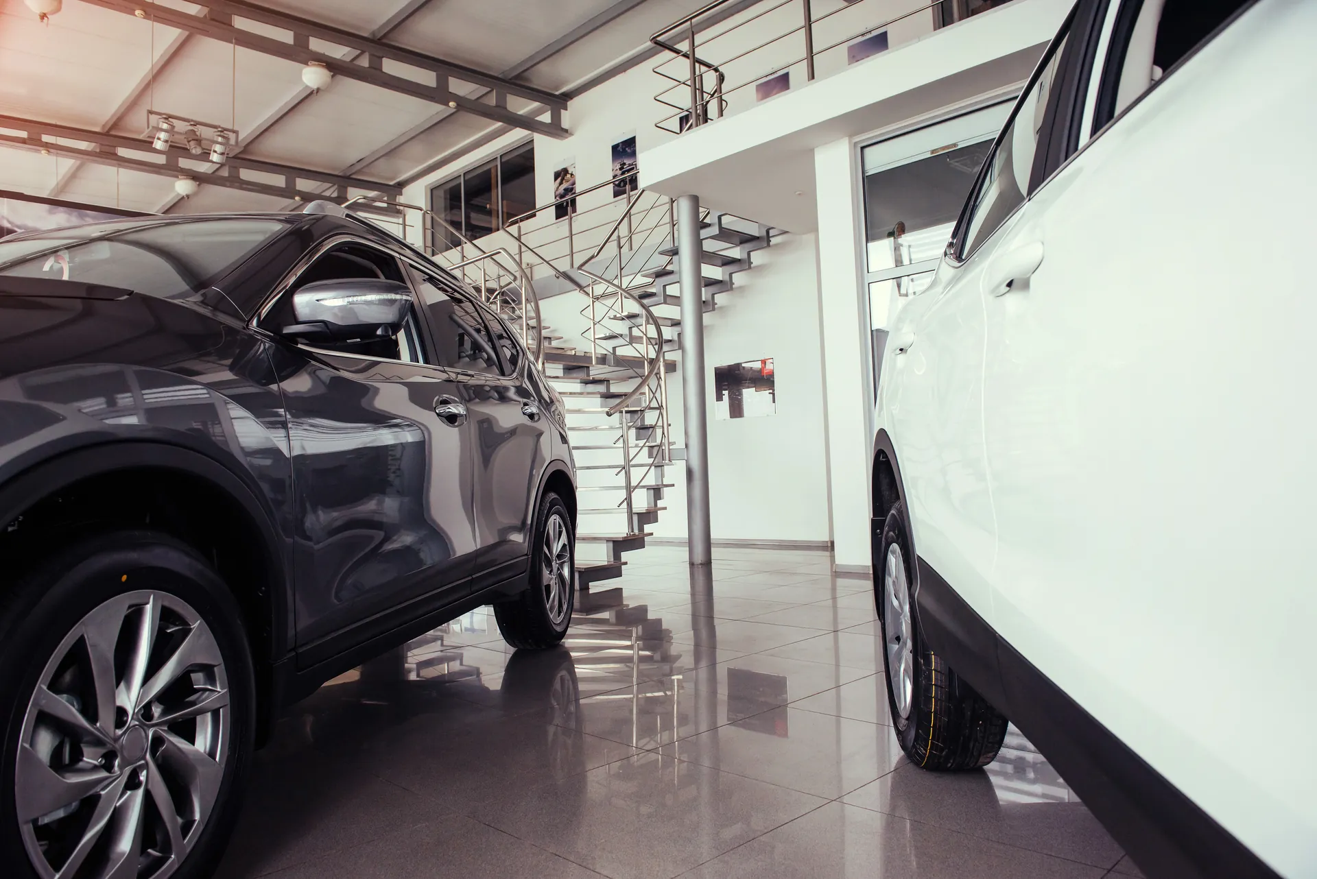 Finished high-gloss garage floor with a car parked on it